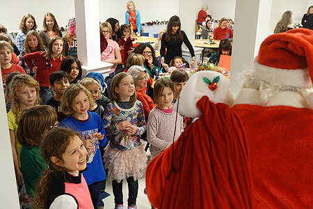 Theosophical Society - Prairie School students enjoy an audience with Santa at the 2016 Christmas party.